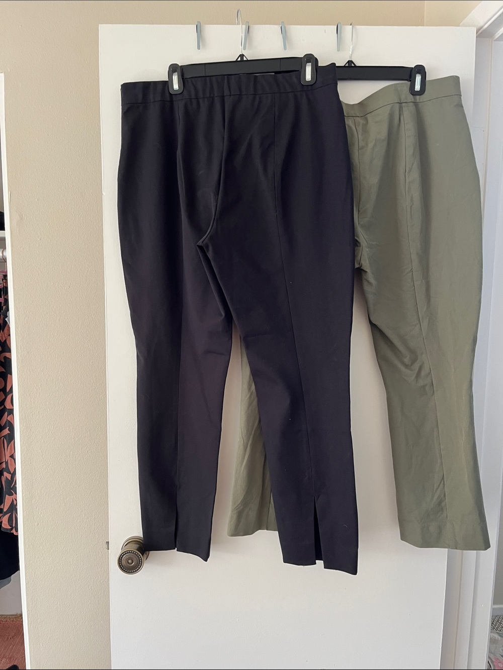 Two pair Everlane Black and olive green cropped pants.